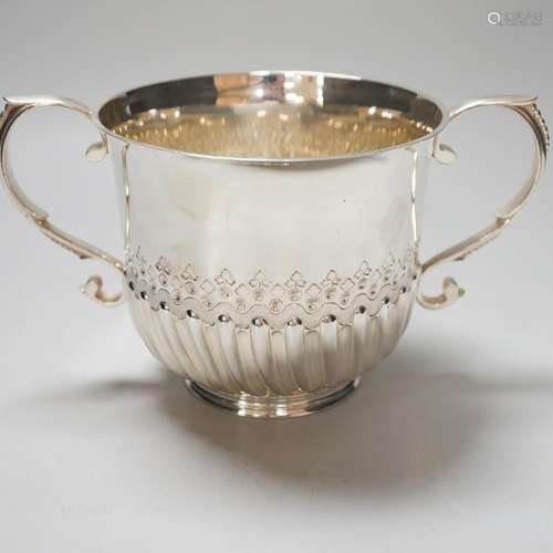 A Victorian silver loving cup, with scroll handles and demi-...