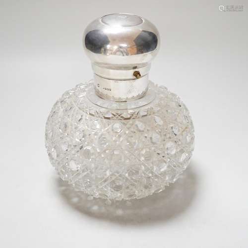 A large Victorian silver mounted globular cut glass atomiser...