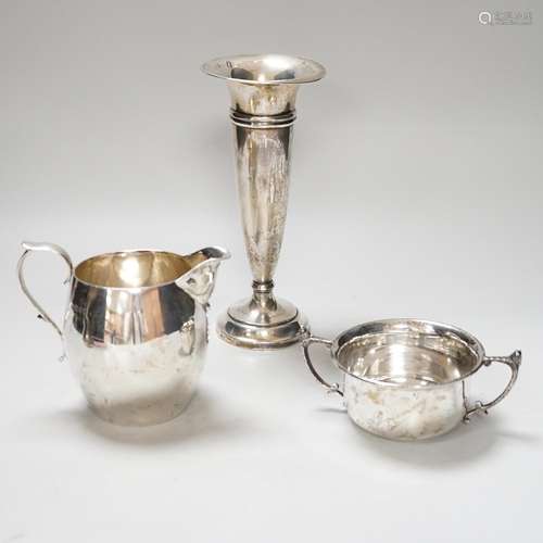 A George V silver cream jug, London 1926, 216 grams, a sugar...