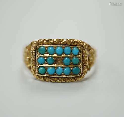 A Victorian gold dress ring, set with three rows of small tu...