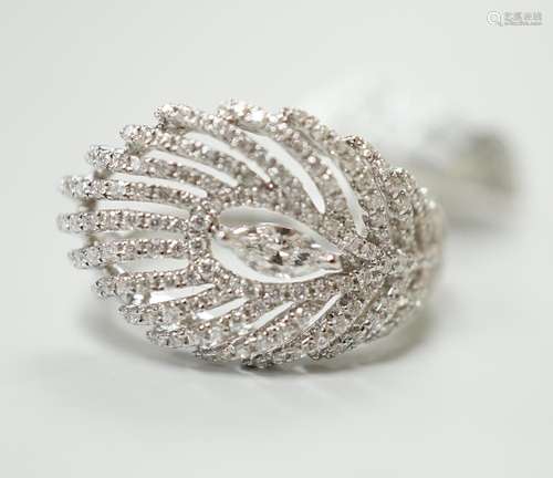 An 18ct white gold and diamond peacock feather design ring, ...