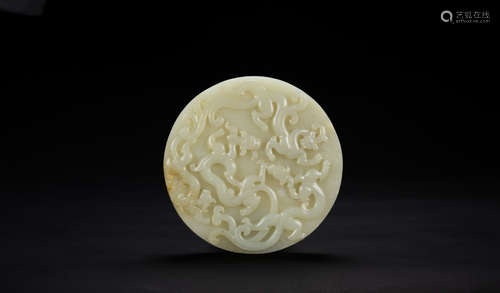 Qing - A White Jade Carved ‘Chilong’ Bi