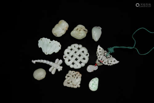 Qing - A Group Of 8 Carved White Jade Pendants And Two Carve...