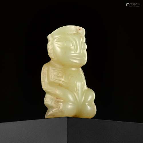 AN EXTREMELY RARE YELLOW JADE ‘KNEELING FIGURE’, SHANG DYNAS...