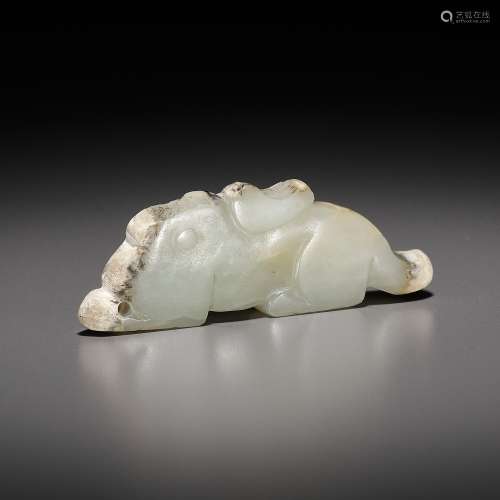 A JADE ‘RABBIT’ PENDANT, LATE SHANG TO EARLY WESTERN ZHOU DY...