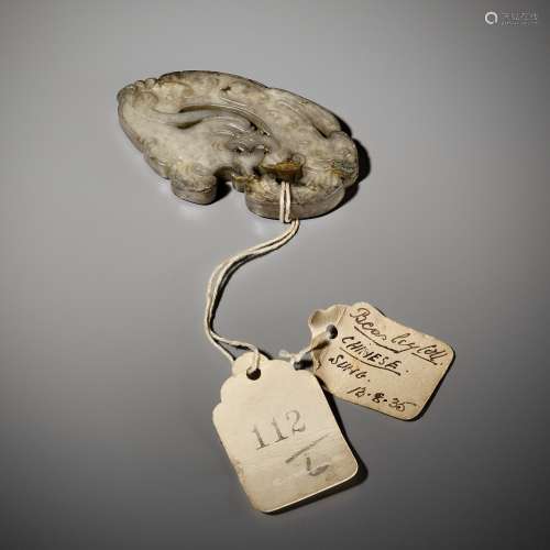 A GRAY JADE ‘DRAGON’ PENDANT, LATE MING TO EARLY QING DYNAST...