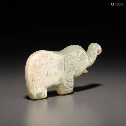 A JADE ‘ELEPHANT’ PENDANT, LATE SHANG DYNASTY, ANYANG PHASE