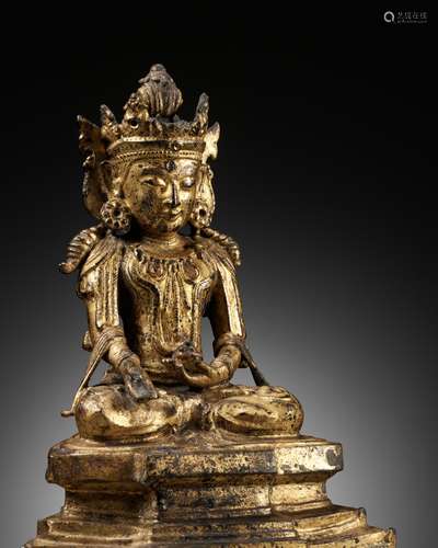 AN ARAKAN STYLE GILT BRONZE FIGURE OF BUDDHA RATNASAMBHAVA, ...