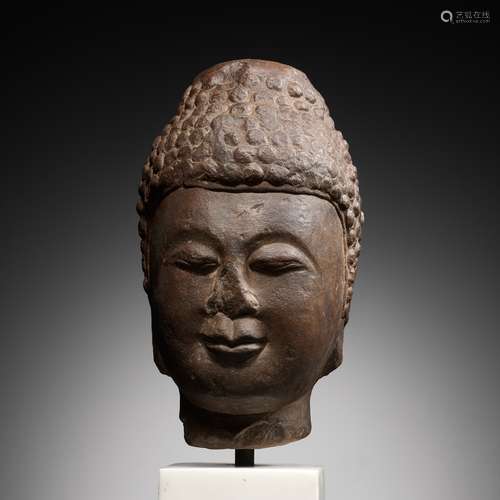 A LIMESTONE HEAD OF BUDDHA, TANG DYNASTY, CHINA, 7TH - EARLY...