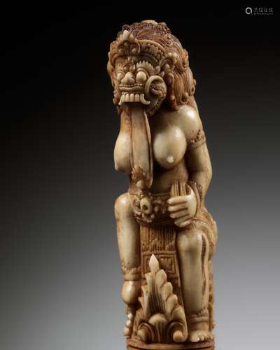 A CARVED BONE KRIS HILT IN THE FORM OF A FEMALE DEMON, INDON...