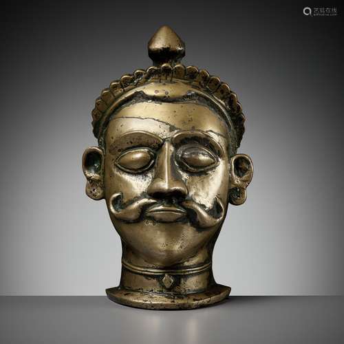 A BRASS LINGAM COVER WITH THE HEAD OF SHIVA, MAHARASHTRA, 18...