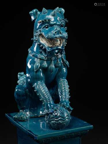 A RARE AND MASSIVE TURQUOISE-GLAZED FIGURE OF A BUDDHIST LIO...