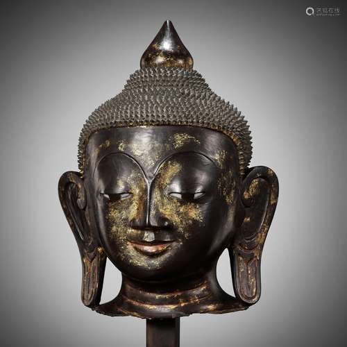 A MONUMENTAL GILT DRY LACQUER HEAD OF BUDDHA, AVA STYLE, BUR...