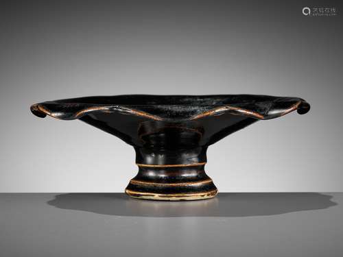 A RARE YAOZHOU BLACK-GLAZED FOLIATE STEMCUP, SONG DYNASTY