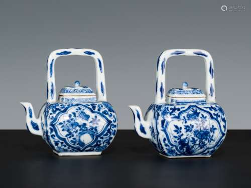 A RARE PAIR OF BLUE AND WHITE MINIATURE TEAPOTS AND COVERS, ...