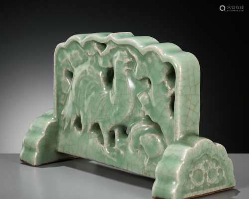 A LONGQUAN CELADON ‘ROOSTER, HEN AND CHICKS’ TABLE SCREEN, Y...