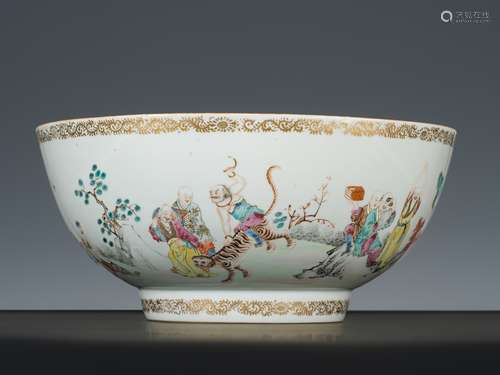 A GILT FAMILLE-ROSE ‘EIGHTEEN LUOHAN’ PUNCH BOWL, QIANLONG P...