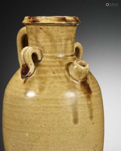 AN IRON-SPLASHED AND AMBER-GLAZED EWER, TANG DYNASTY