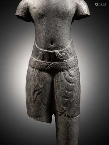 A GRAY SANDSTONE TORSO OF A MALE DEITY, ANGKOR PERIOD, BAPHU...