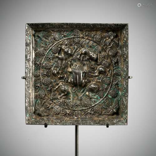 A SILVERY BRONZE SQUARE ‘LION AND GRAPEVINE’ MIRROR, TANG DY...