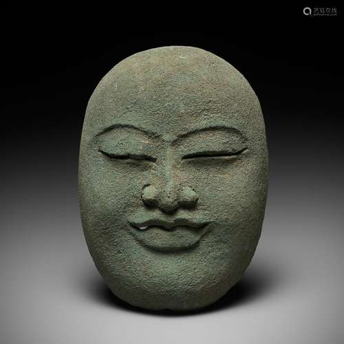 A BRONZE DEATH MASK, GOA MADE, EAST JAVA, INDONESIA, 1ST MIL...