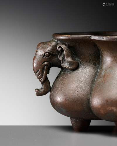 A SMALL QUATREFOIL ‘ELEPHANT’ BRONZE INCENSE BURNER, EARLY Q...