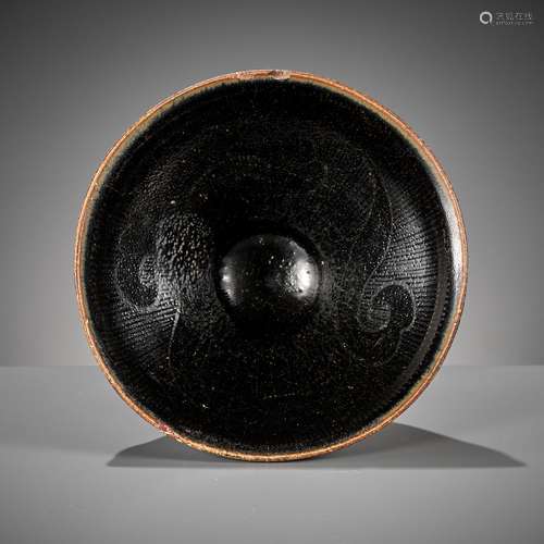 A CIZHOU SILVER-DECORATED AND BLACK-GLAZED TEA BOWL, SOUTHER...