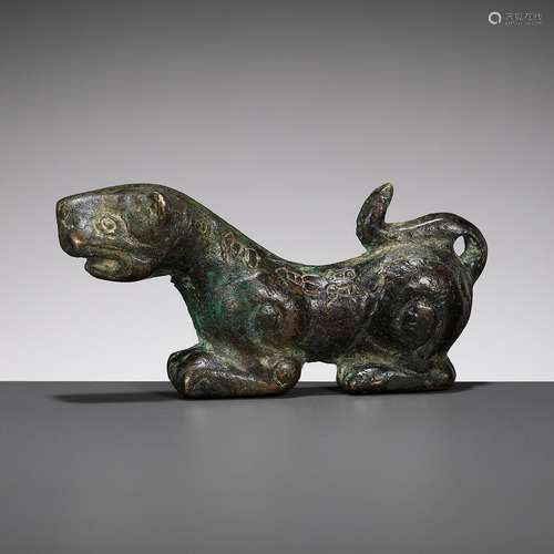 AN INSCRIBED HALF OF A BRONZE TIGER TALLY, EASTERN HAN DYNAS...