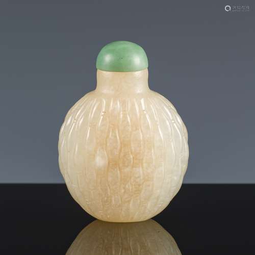 A PALE CELADON JADE 'BASKET WEAVE' SNUFF BOTTLE, MID-QING DY...