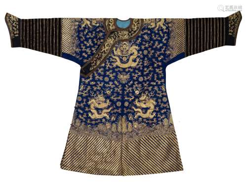 A GOLD-EMBROIDERED BLUE-GROUND SEMIFORMAL NINE-DRAGON ROBE, ...