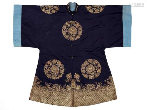 A WOMAN’S SILVER AND GOLD-EMBROIDERED SILK ROUNDEL ROBE, 19T...