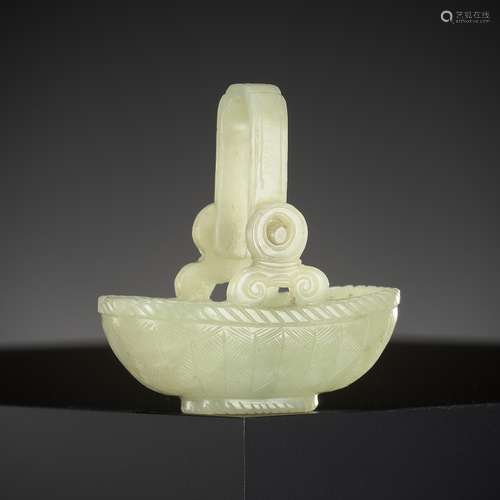 A YELLOW JADE CARVING OF A BASKET WITH MOVABLE HANDLE, CHINA...