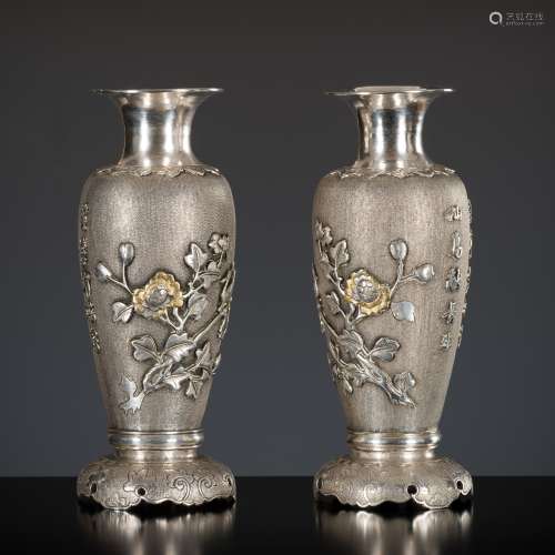 A PAIR OF INSCRIBED AND PARCEL-GILT SILVER ‘BIRDS AND FLOWER...