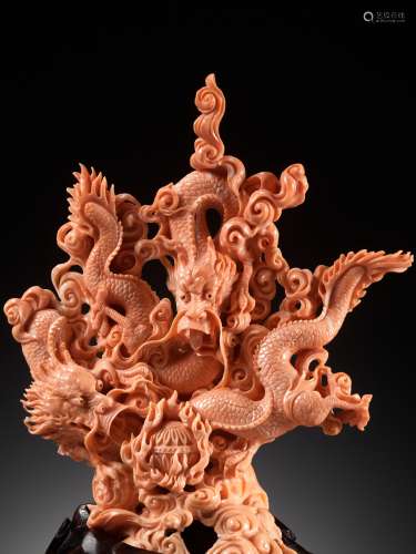 A SUPERB CORAL CARVING OF A DRAGON IN FRONT VIEW, LATE QING ...