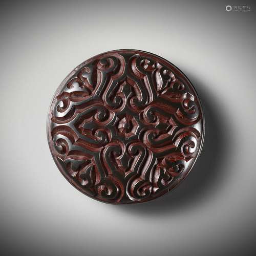 A BLACK AND CINNABAR TIXI LACQUER CIRCULAR BOX AND COVER, MI...