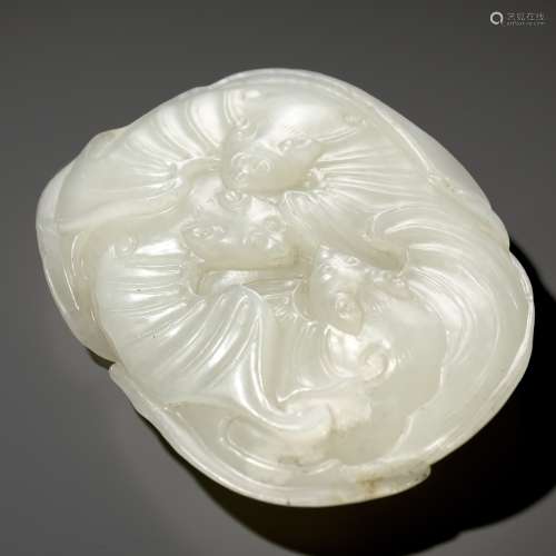 A RARE AND FINE WHITE JADE ‘FIVE BATS’ (WUFU) WEIGHT, 18TH C...