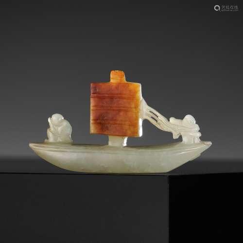A PALE CELADON AND RUSSET JADE CARVING OF A SAILING BOAT, QI...