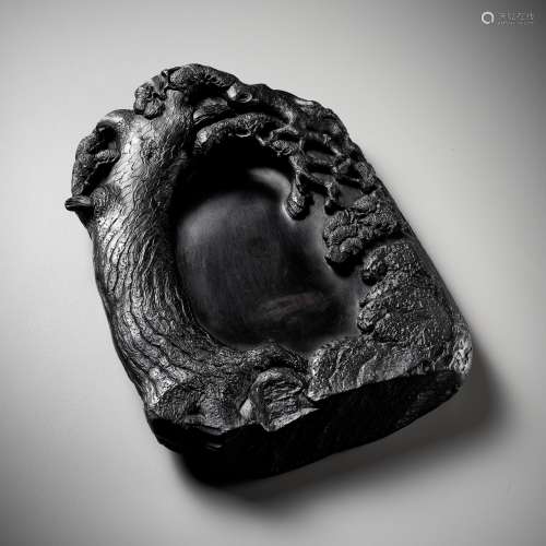 A BLACK DUAN ‘PINE TREE’ INKSTONE, QING DYNASTY