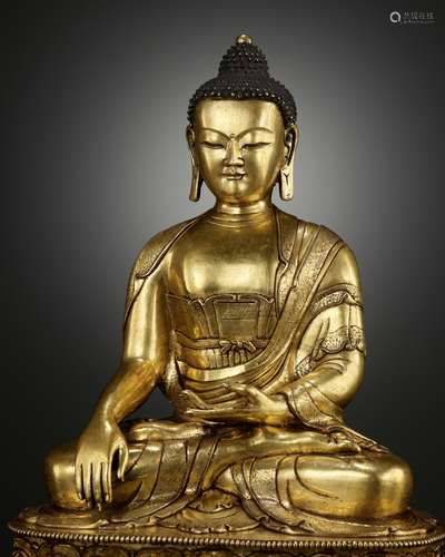 A LARGE GILT-BRONZE FIGURE OF BUDDHA SHAKYAMUNI, KANGXI TO Y...