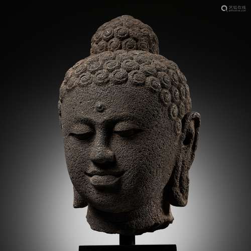 AN IMPORTANT OVER-LIFESIZE ANDESITE HEAD OF BUDDHA, CENTRAL ...