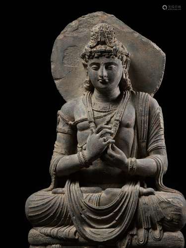 A LARGE GRAY SCHIST FIGURE OF MAITREYA, KUSHAN PERIOD, ANCIE...