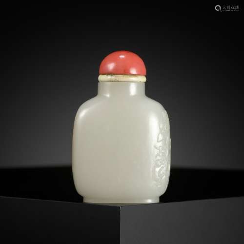 A WHITE JADE WITH RUSSET SKIN ‘MONKEYS’ SNUFF BOTTLE, CHINA,...