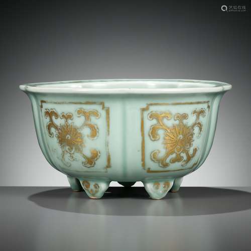 A MOLDED, LOBED AND GILT CELADON-GLAZED JARDINIÈRE, QIANLONG...