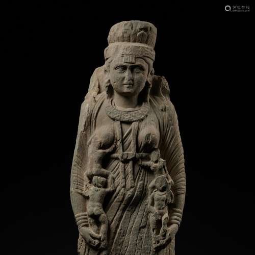 A MONUMENTAL SCHIST FIGURE OF THE GODDESS HARITI, ANCIENT RE...