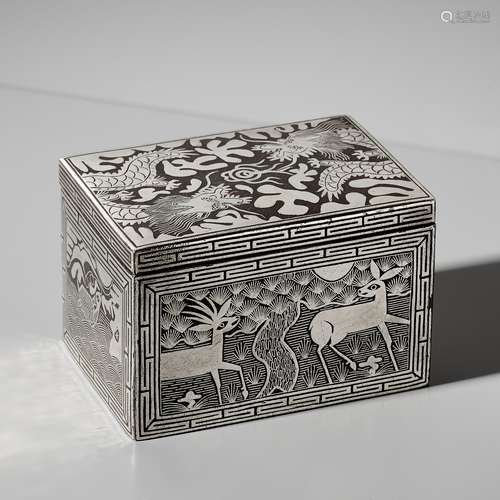 A SILVER AND COPPER-INLAID IRON ‘MYTHICAL ANIMALS’ TOBACCO B...