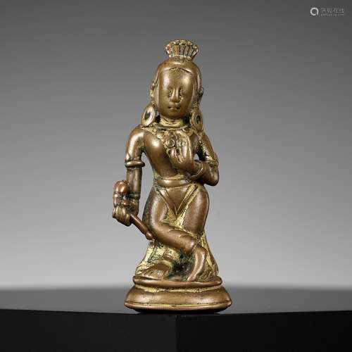 A COPPER-INLAID COPPER ALLOY FIGURE OF DEVI, NEPAL, 10TH-11T...