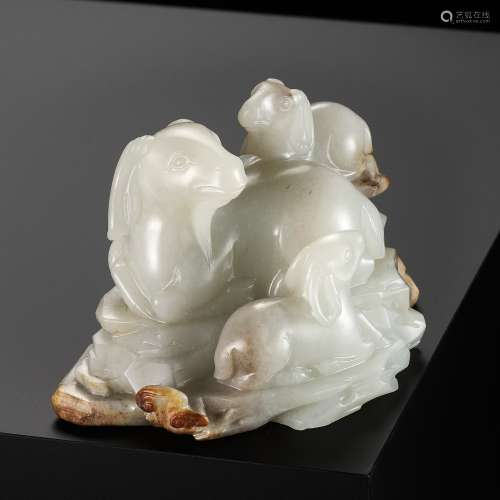 A WHITE AND RUSSET JADE ‘SANYANG AND LINGZHI’ GROUP, QING DY...