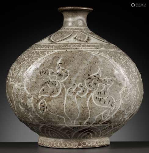 A SLIP-INLAID CELADON-GLAZED STONEWARE OIL BOTTLE, GORYEO DY...