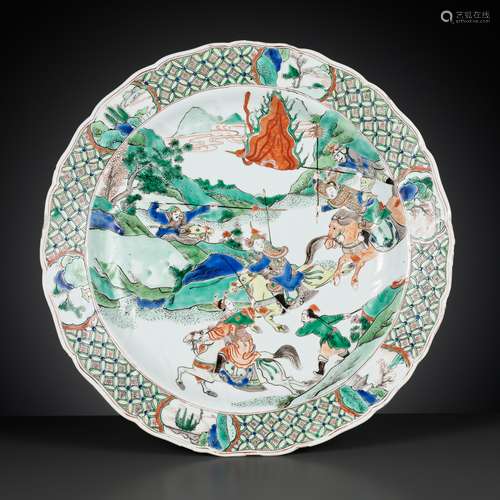 A LARGE AND BARBED FAMILLE VERTE ‘WARRIOR’ DISH, KANGXI PERI...