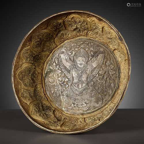 AN IMPORTANT SILVER-INLAID GOLD REPOUSSÉ BOWL DEPICTING GARU...